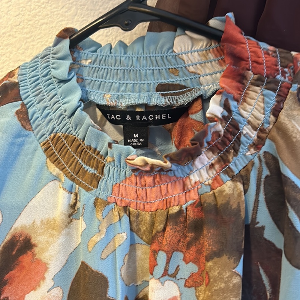 Zac & Rachel woman’s transparent blouse